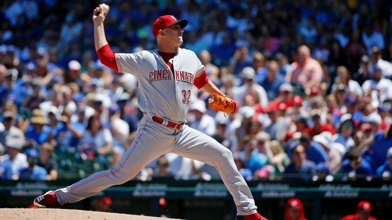 Reds starting pitcher Matt Harvey delivers a pitch