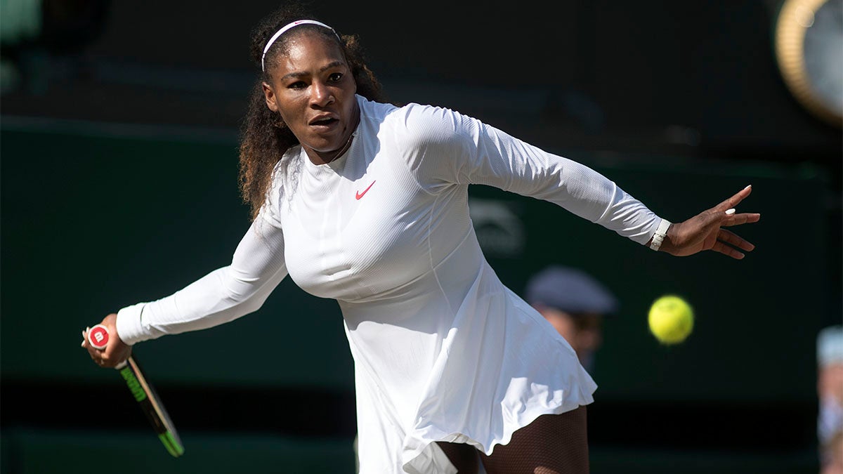 Serena Williams returns a shot in the Ladies’ Singles Final on Center Court at Wimbledon 2018