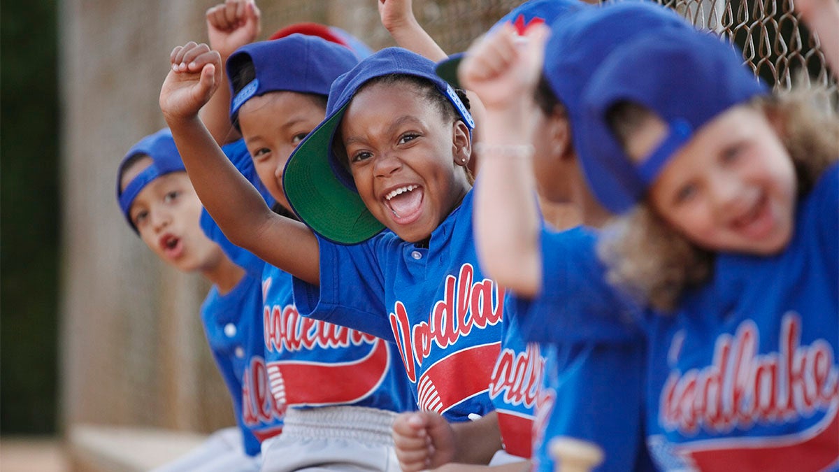 Excited children's Little League team