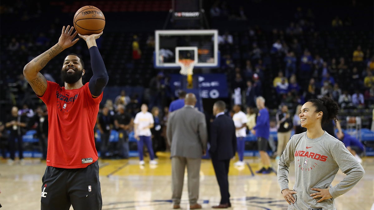 Basketball player shooting before a game