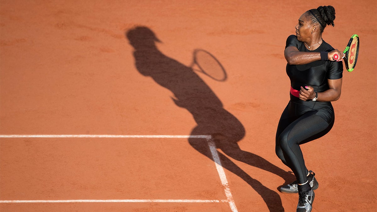 Serena Williams in a compression "catsuit" at the French open playing Tennis