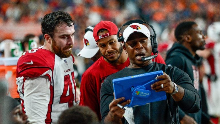 DENVER, CO - AUGUST 29: Offensive coordinator Vance Joseph of the Arizona Cardinals has a word with Tanner Vallejo #48 in the bench area during a game against the Denver Broncos during a preseason National Football League game at Broncos Stadium at Mile High on August 29, 2019 in Denver, Colorado. (Photo by Dustin Bradford/Getty Images)