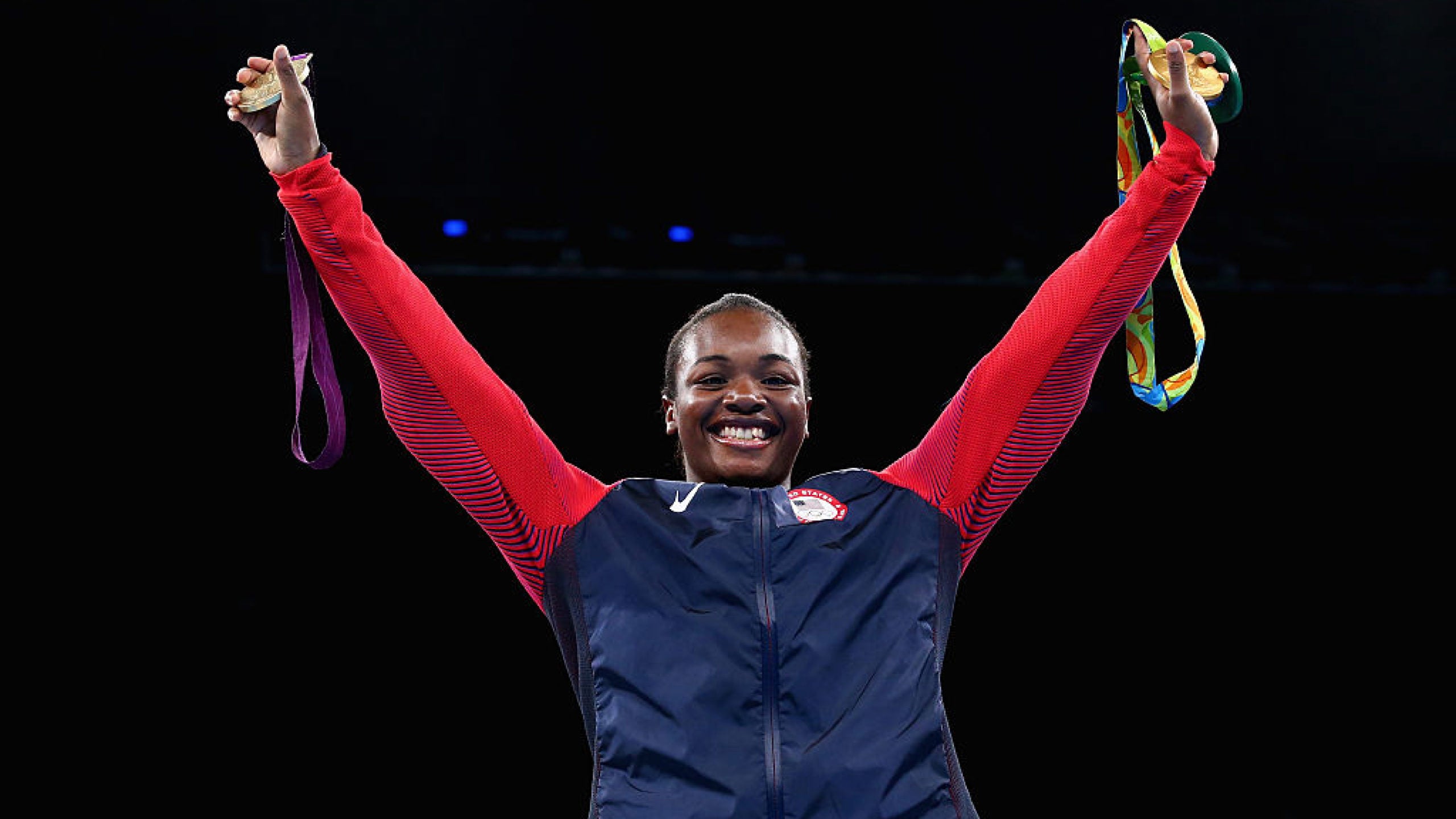 RIO DE JANEIRO, BRAZIL - AUGUST 21: Gold medalist Claressa Maria Shields of the United States poses on the podium during the medal ceremony for the Women's Boxing Middle (69-75kg) on Day 16 of the Rio 2016 Olympic Games at Riocentro - Pavilion 6 on August 21, 2016 in Rio de Janeiro, Brazil. (Photo by Alex Livesey/Getty Images)