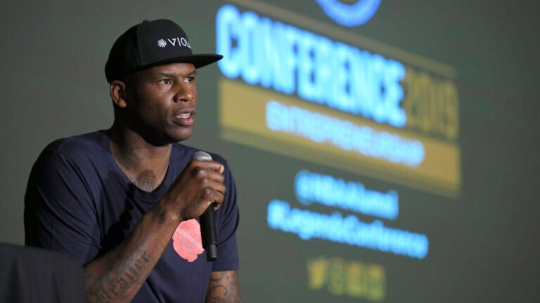 Al Harrington speaking at a conference