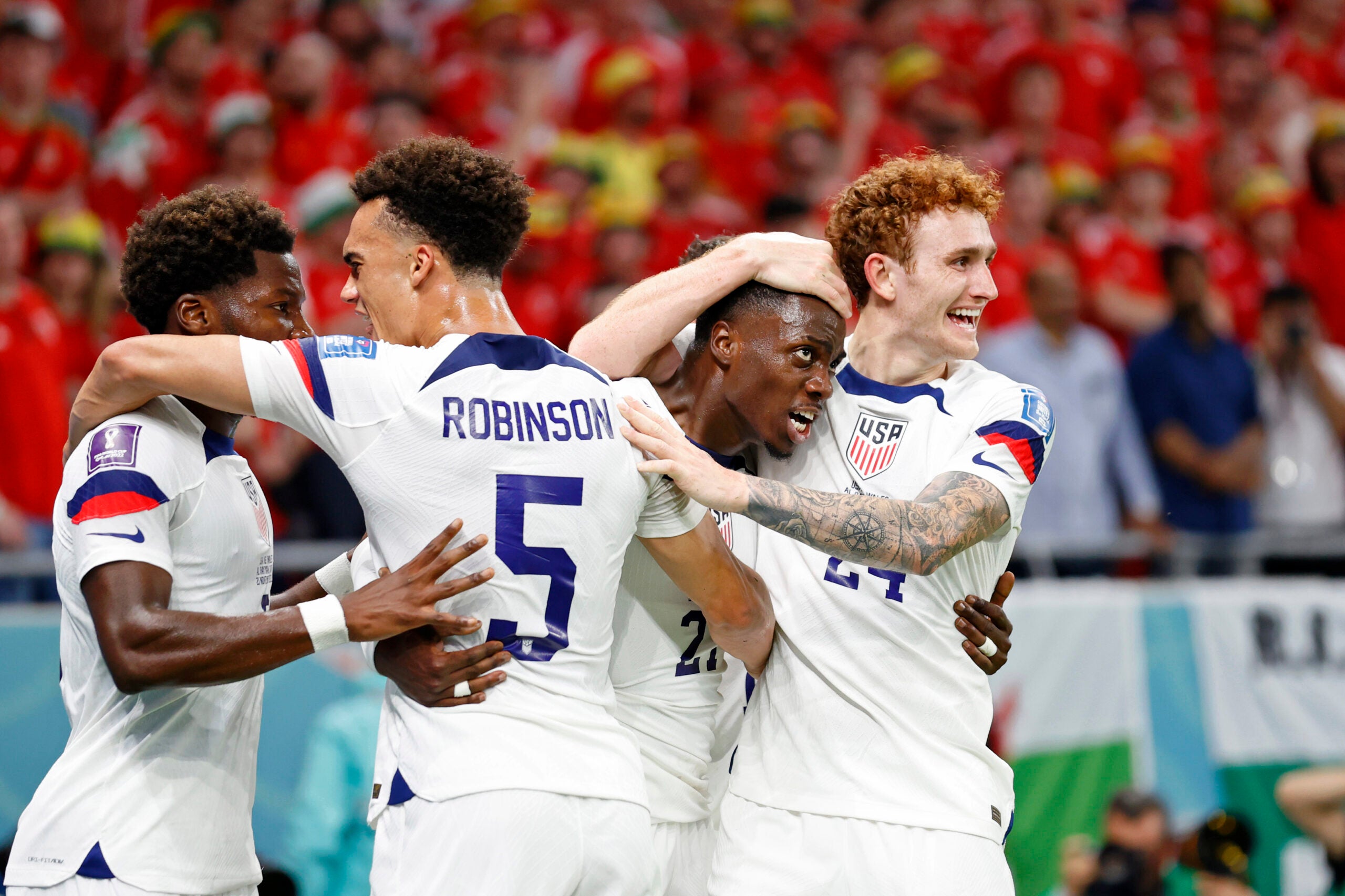 USMNT players celebrate a goal